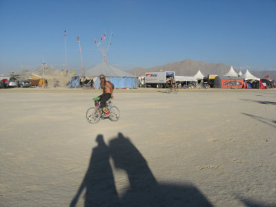 guy riding his bike backwards...