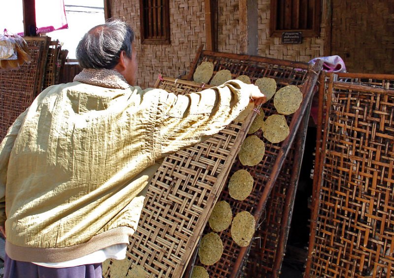 Rice patties being put up to dry