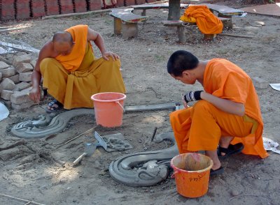 Monks doing restoration work