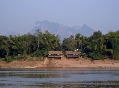 Two houses, mountain background