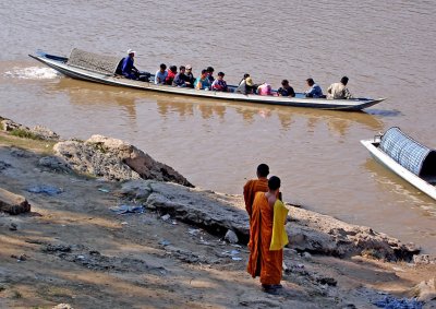 Monks and tourists on the Mekong