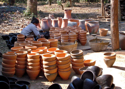Woman staining pots