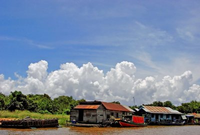 Clouds low over floating houses