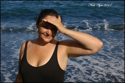 Susan on the black sand beach
