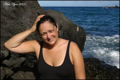 Susan on the black sand beach