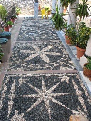 Black and white pebble mosaics at Taxiarches Church at Mesta, Chios Island
