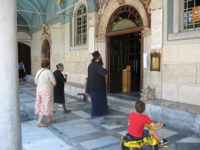 Priest entering church in Agiassos, Lesvos