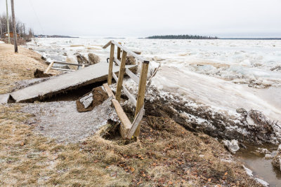 Ice makes short work of sidewalk and stairs in Moosonee 2013 May 3rd.