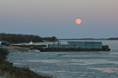 Moon over barges