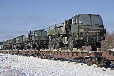 Canadian Army vehicles departing Moosonee