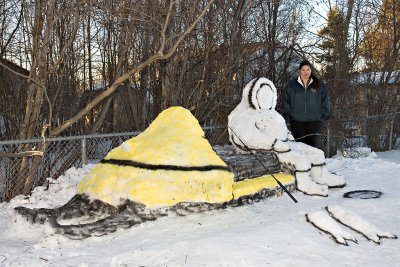 Jennifer Carpenter with snow sculpture she and Joe Nakogee built