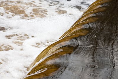 Water flowing over Store Creek dam