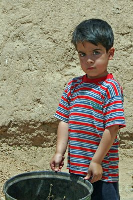 Boy near the Hosseinieh