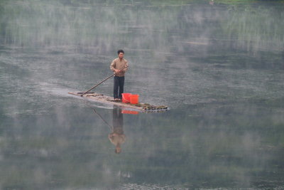 Shrimp fishing in foggy lake.jpg