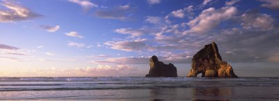 Archway Islands in late afternoon light, Wharariki Beach, Golden Bay