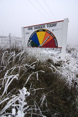 Fire danger sign in hoarfrost, Central Otago, New Zealand