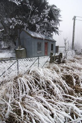 Roadside shed in hoarfrost at Fruitlands Central Otago, New Zealand