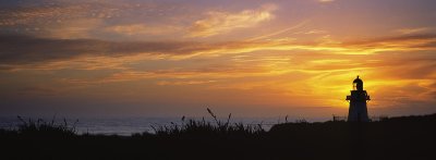 Waipapa Point Lighthouse at sunset, Southland, New Zealand.