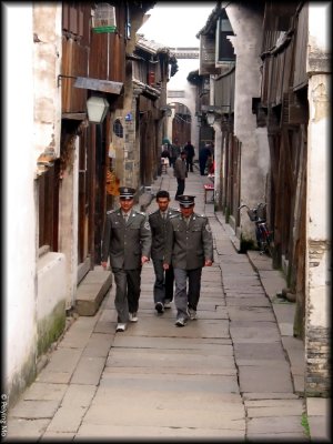 Security policemen are patroling the street to weed out ticketless tourists.