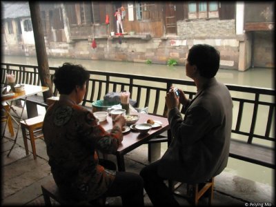 A couple enjoys a simple breakfast while waiting for a candid shot moment