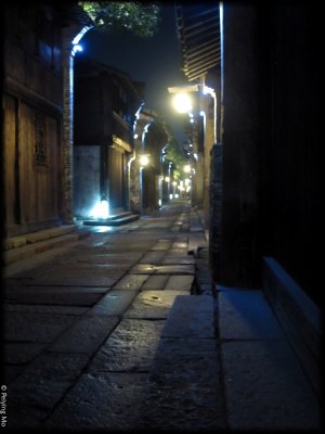 The quiet street is almost ghost-like