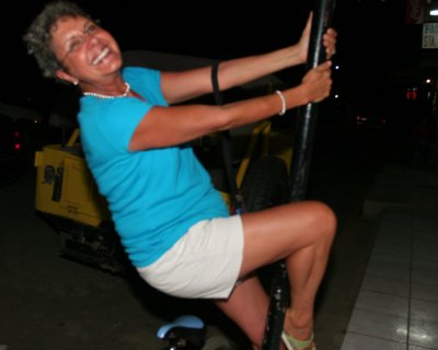 Linda shows off her talent on a pole.