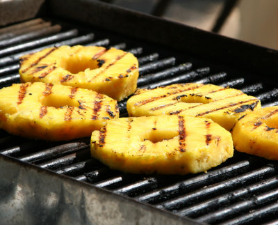 Grilled Pineapple with Vanilla Ice Cream and Rum Sauce