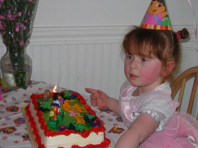 Tay could care less about blowing out the candles but she is demanding  a fork