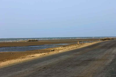 The road by the Walvis Bay lagoon is made of salt