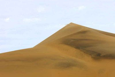 Giant sand dune just outside Walvis Bay at Rooibank