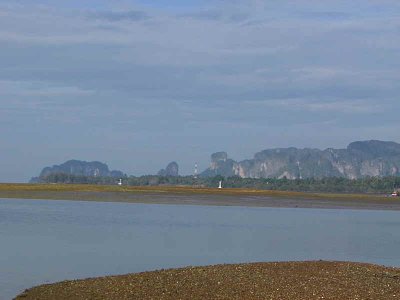 The low tide exposes huge sandbars at the mouth of the river at Krabi where thousands of waders can be found
