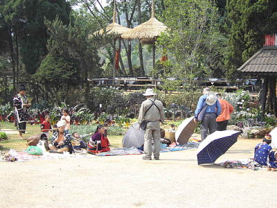 Gardens by the restaurant area at the Doi Ang Khang Royal Project, local ladies selling crafts