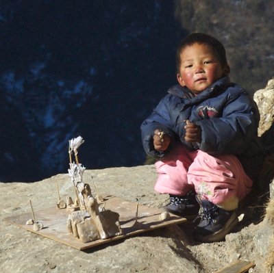 Kid playing outside Namche