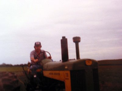 Martin driving Clarence and Harold's 730 JD tractor!