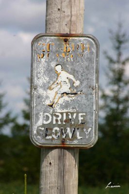 drive slowly so you can read the sign