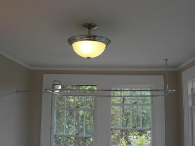new light, new sheetrock ceiling, and picture molding