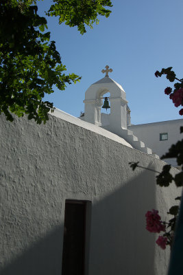 Church view from inside a small alley - Mykonos Island