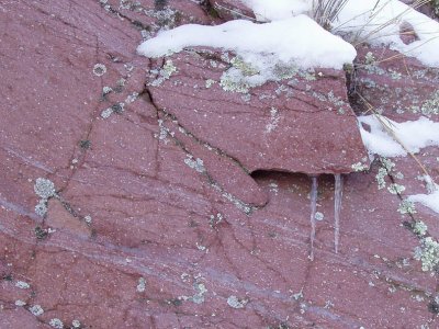 Icicles on boulder (specifically, a porpyritic andesite boulder)