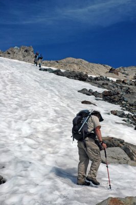Hikers Heading Up Snowfield