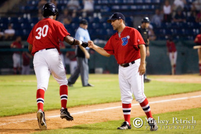 Coach Phil Plantier congratulates Courtney Billingslea - Home Run