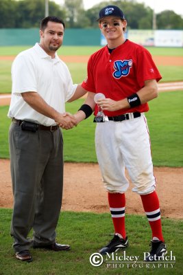 Chris Allen, COO of the South Coast League, awards Scott Robinson Most Outstanding Hitter