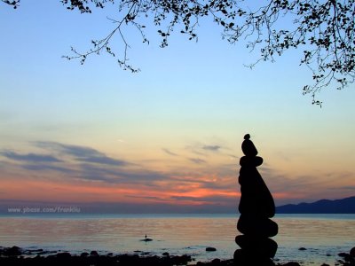 Rock balancing on the beach