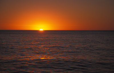 Sunset into sea