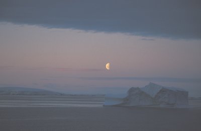 Iceberg with half moon East Greenland