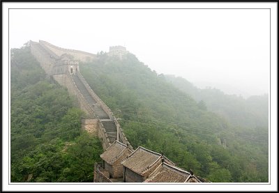 The Great Wall blanketed by morning fog, Beijing, China