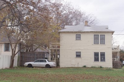 Side of W Neely home and backyard taken from 700 block Elsbeth