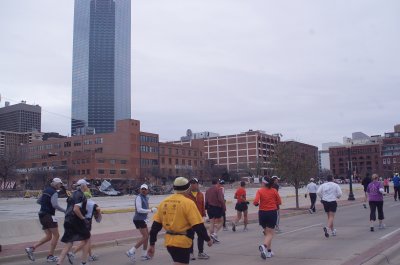 Downtown Dallas in the Background as these slower Marathoners go down the course
