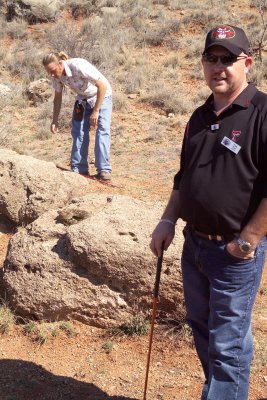 Three Jaycees members working the two snakes