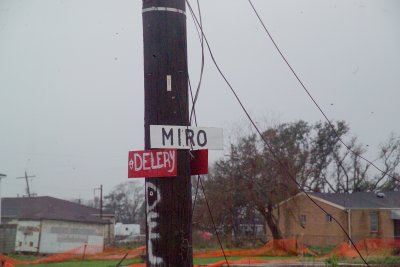 People Putting up Hand Painted Street Signs