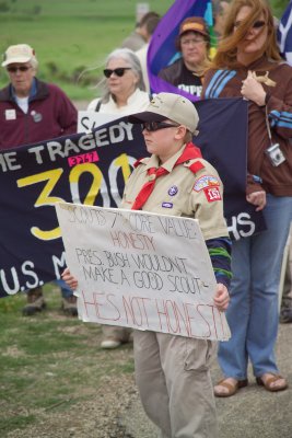 Boy Scout from Texas Troop 153 with his statement on how he feals about President Bush on Prairie Chapel Road